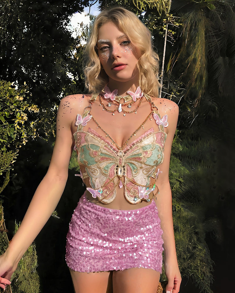 Embroidered butterfly sequin top with pink butterfly accents and pearl chain, paired with pink mini skirt