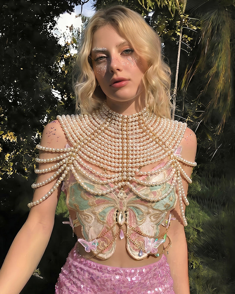 Pearl beaded butterfly sequin top with layered necklace detail and pink sequin mini skirt