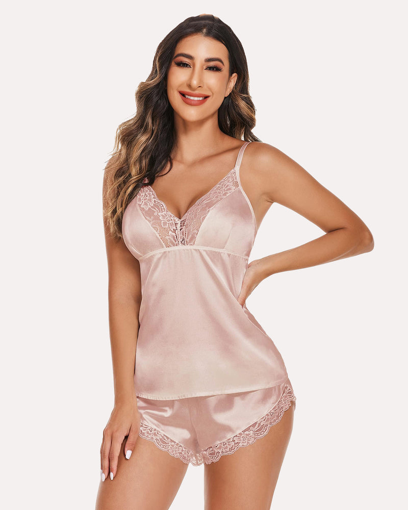 Light pink satin pajamas set with lace trim. Avidlove lingerie camisole and shorts.