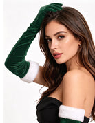 Long green velvet glove with white cuff, shown on a model