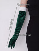Long green velvet glove with white cuff and measurement labels
