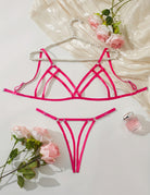 Hot pink strappy bra and thong set with criss-cross cup details