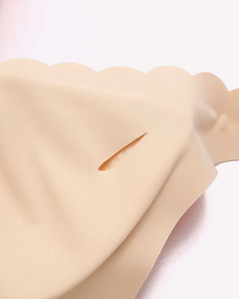 Beige seamless V-neck bra fabric detail, scalloped edge, smooth, full coverage, breathable design.