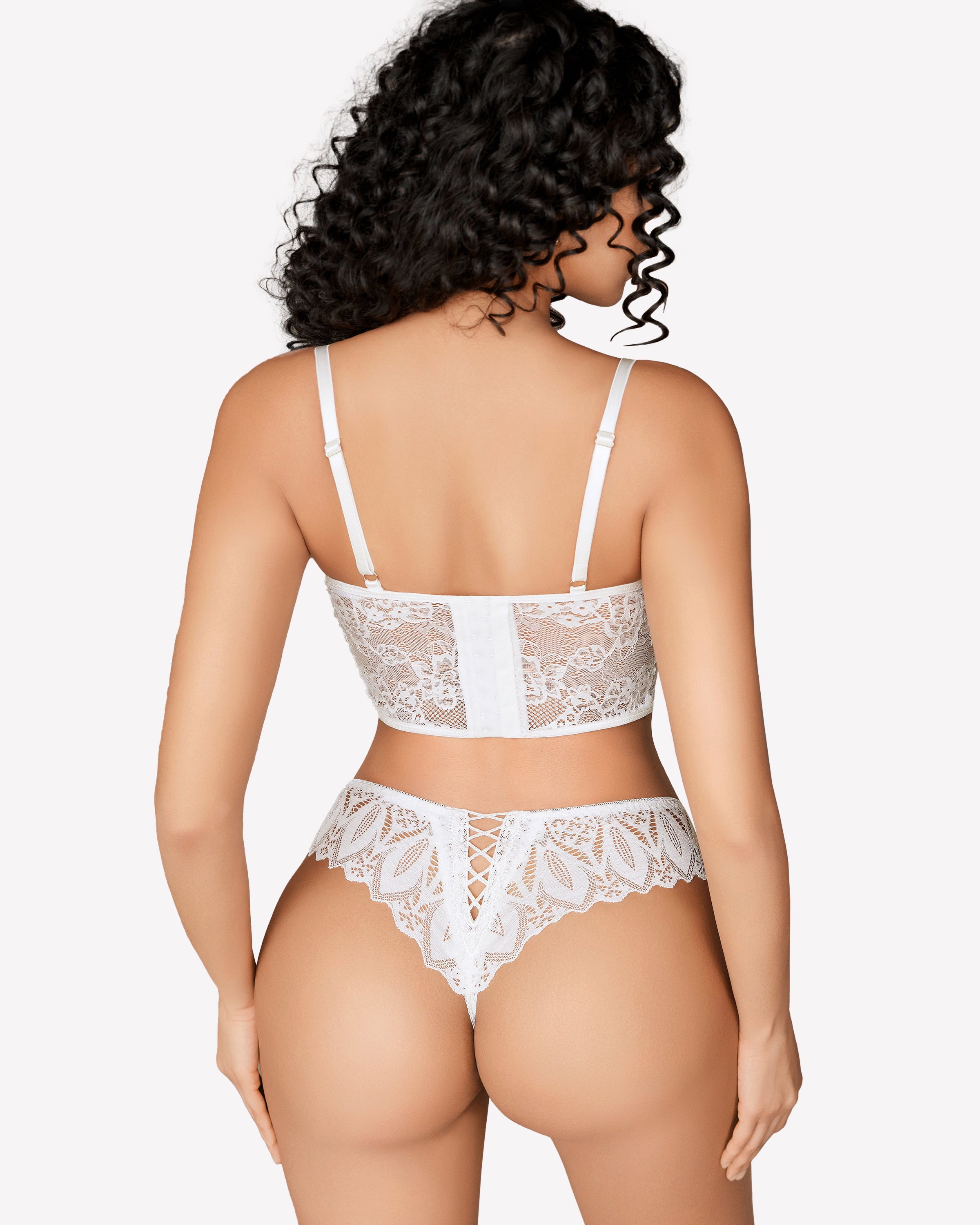 White lace cheeky thong lingerie set. Sexy lingerie for women. Features delicate lace.