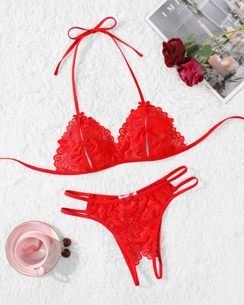 Red lace bra and panty set. Halter tie design, with floral lace details for a playful allure.