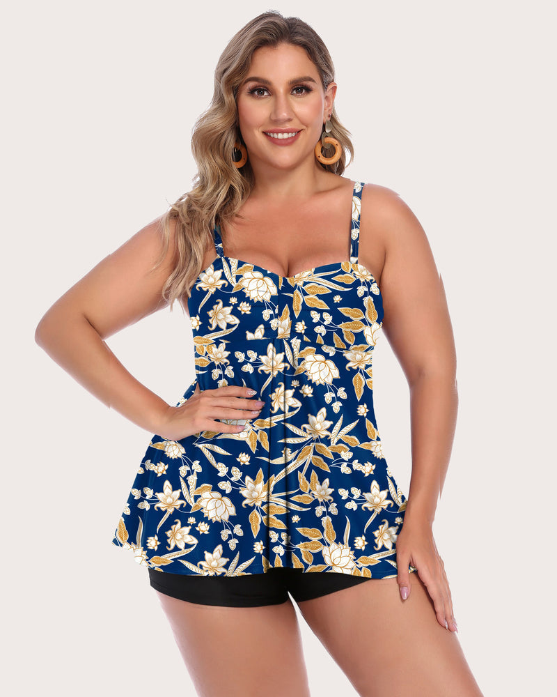 Women's floral tankini swimsuit set, adjustable straps, black shorts. Stylish swimwear for sun.