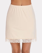 Elegant white half slip skirt featuring side slit and lace trim on the hem.