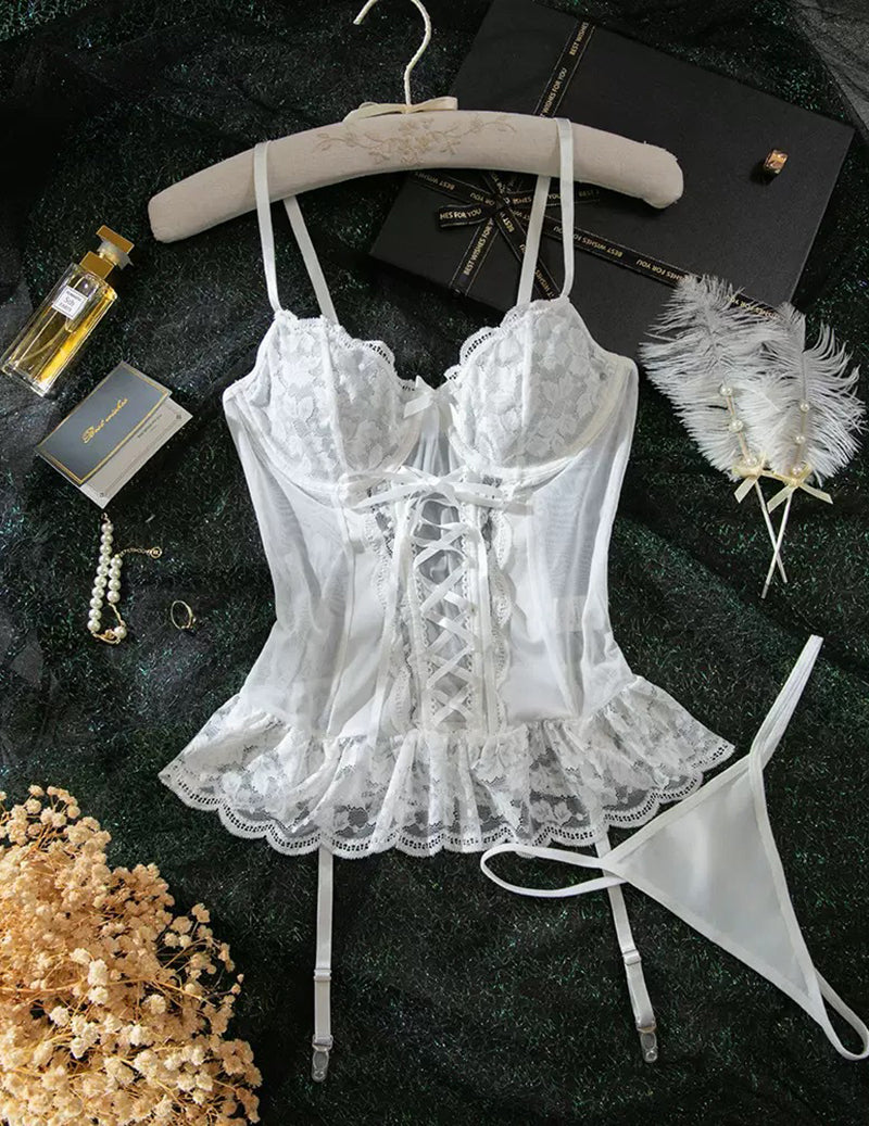 White lace corset top with garter straps and bow-front detail