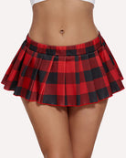 Flirty pink pleated mini skirt with an elastic waistband on model highlighting its playful design.