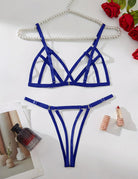 Royal blue strappy bra and thong set with geometric cup straps