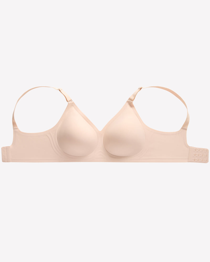 Beige wireless push-up bra, V-neck, full coverage, seamless smoothing, adjustable straps, comfortable.