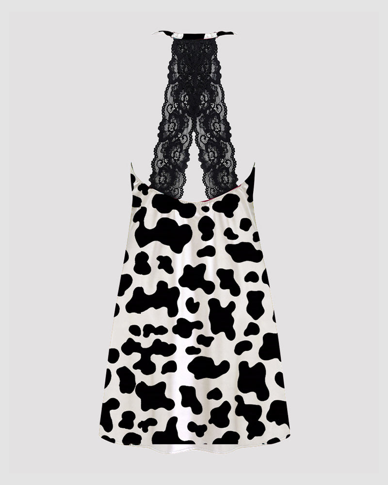 Women's black cow print satin pajama dress with lace back detail, comfortable and stylish sleepwear