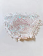 Milky white sheer ruffle brief with iridescent finish and elastic waist