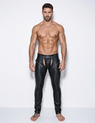 Men's black faux leather tight-fit pants, studded waistband and front cutout detail