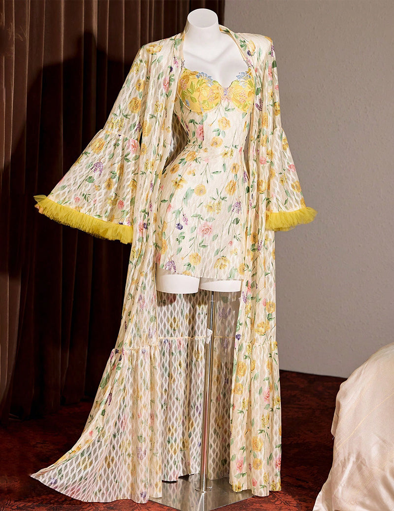 Floral kimono robe on mannequin with yellow feather-trim hem and open-front sleeves