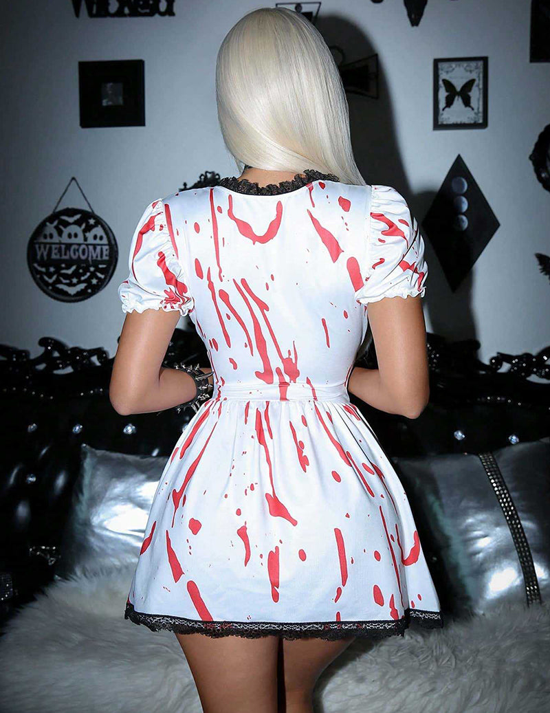 White and red splatter mini dress from back with gathered waist and puff sleeves