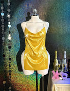 Yellow metallic bodycon mini dress on mannequin with cowl neckline and thin straps