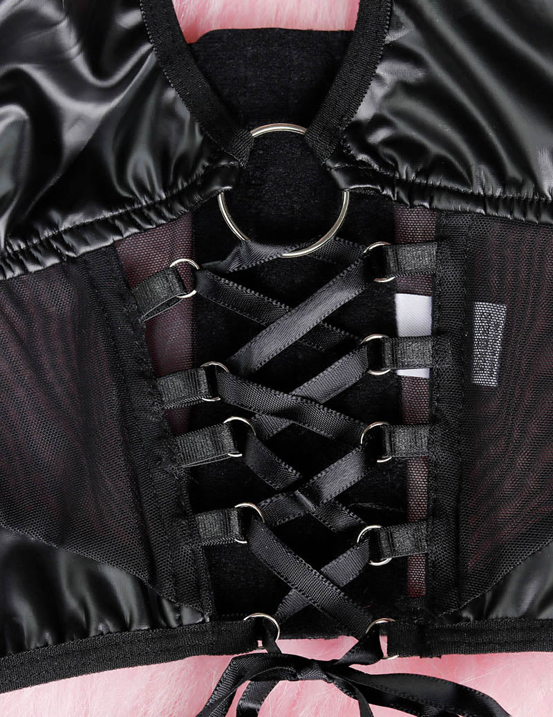 Close-up of black halter lingerie top with ring clasp and lace-up strap front