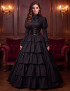 Black tiered maxi gown with puff sleeves and lace-up waist cincher