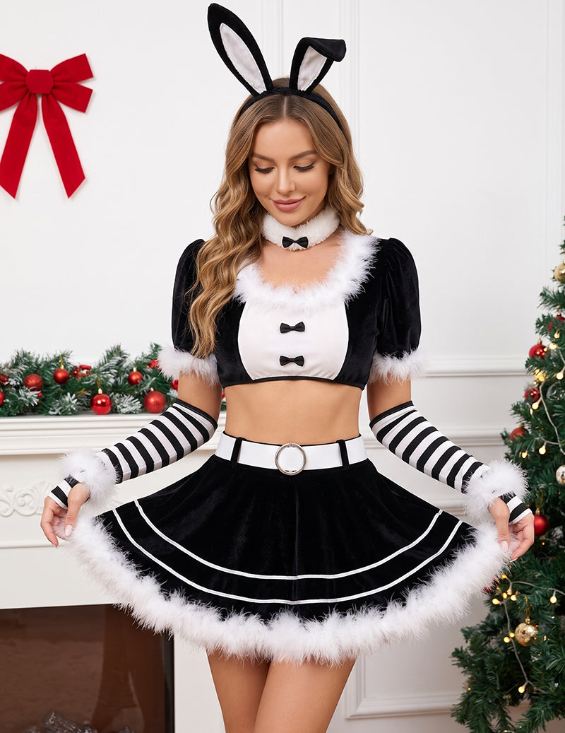 Black velvet bunny costume with fur-trimmed top and skirt, bunny ears and striped arm sleeves