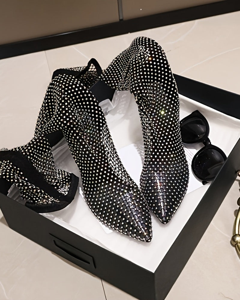 Black rhinestone fishnet over-the-knee stiletto boots with pointed toes