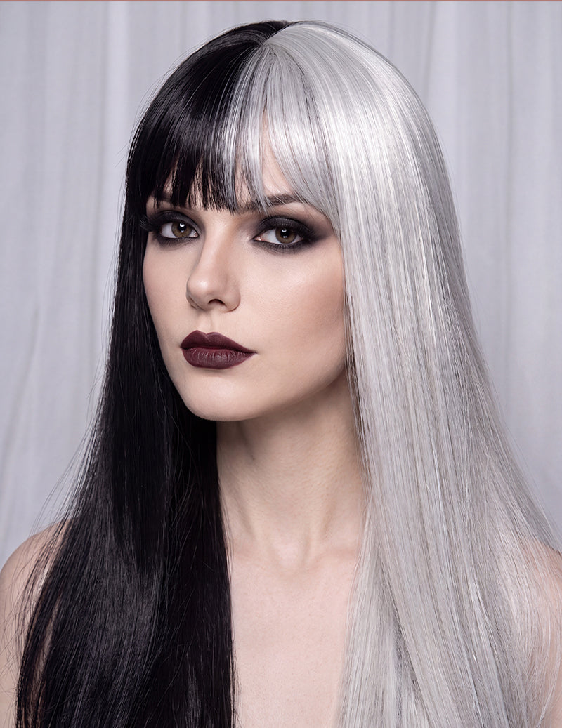 Two-tone wig with long straight black and silver hair, blunt bangs.