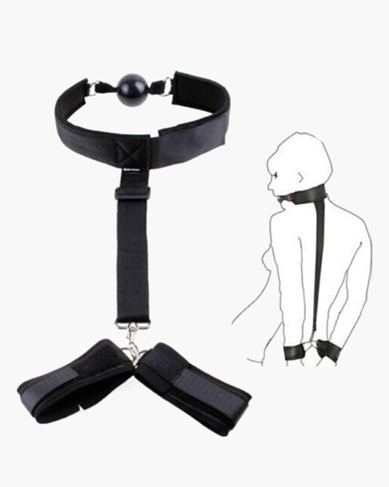 Black adjustable strap set with mouth gag and wrist restraints for intimate sessions