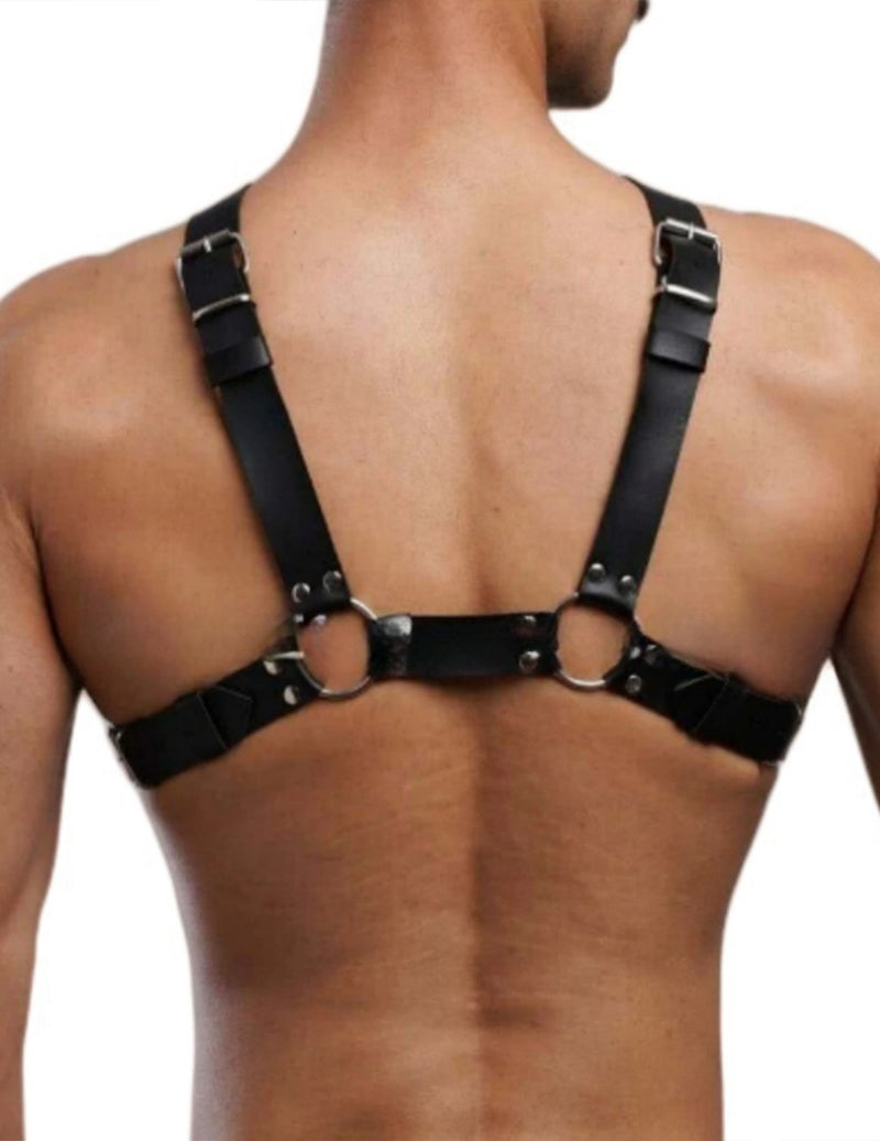 Men's faux leather body harness, black back view with O-ring connectors