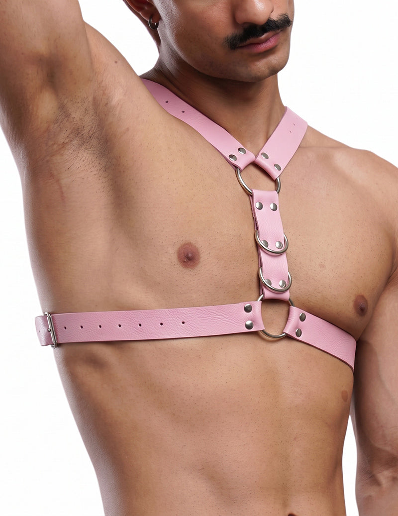 Men's faux leather body harness in pink with O-ring chest and shoulder straps