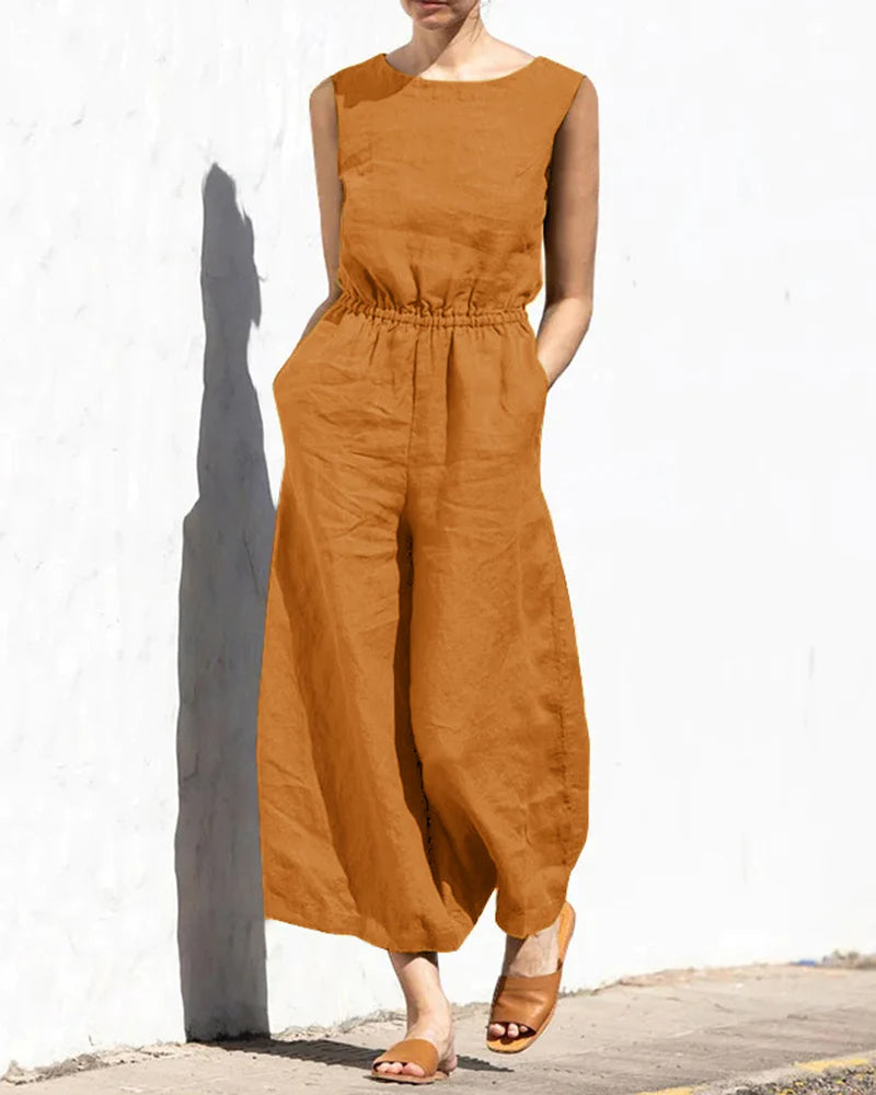 Rust-orange wide leg cotton jumpsuit with elastic waist, perfect for casual and daily wear.