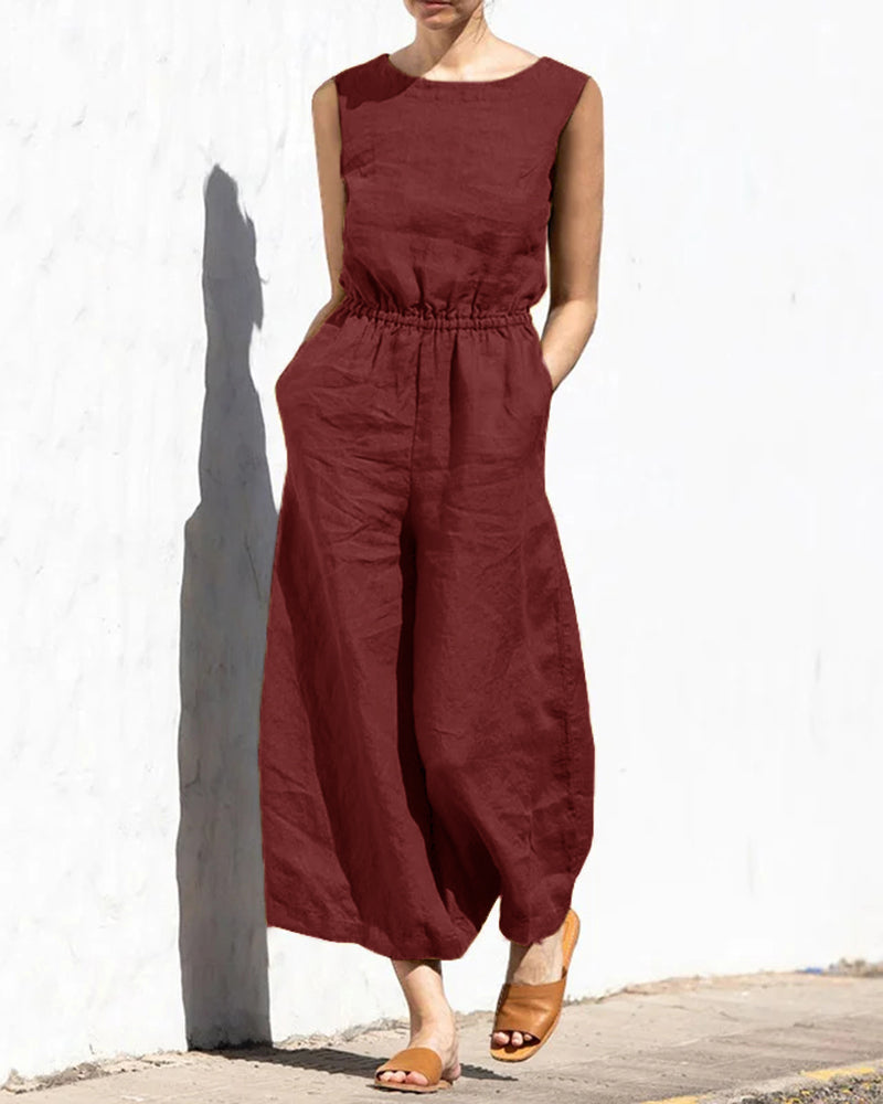Rust-red wide leg cotton jumpsuit with elastic waist, perfect for casual and daily wear.