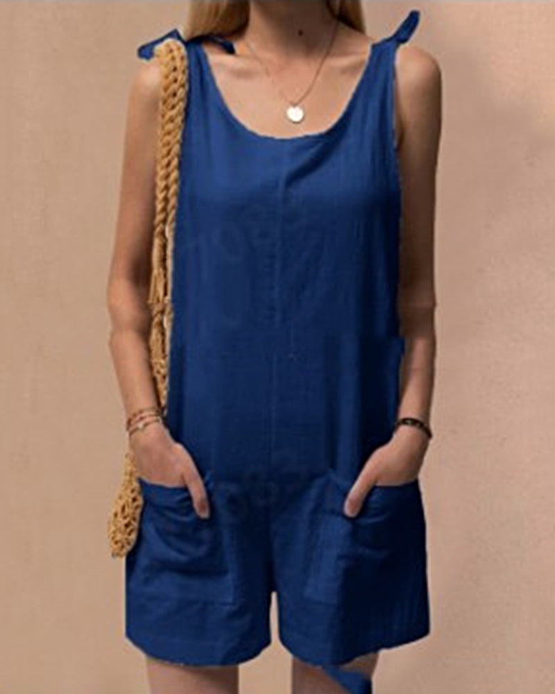 Blue linen shorts jumpsuit with tie straps, casual summer outfit, front pockets, linen