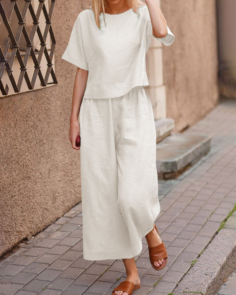 Cream linen two-piece set, casual style. Loose fit top and wide leg pants for women.