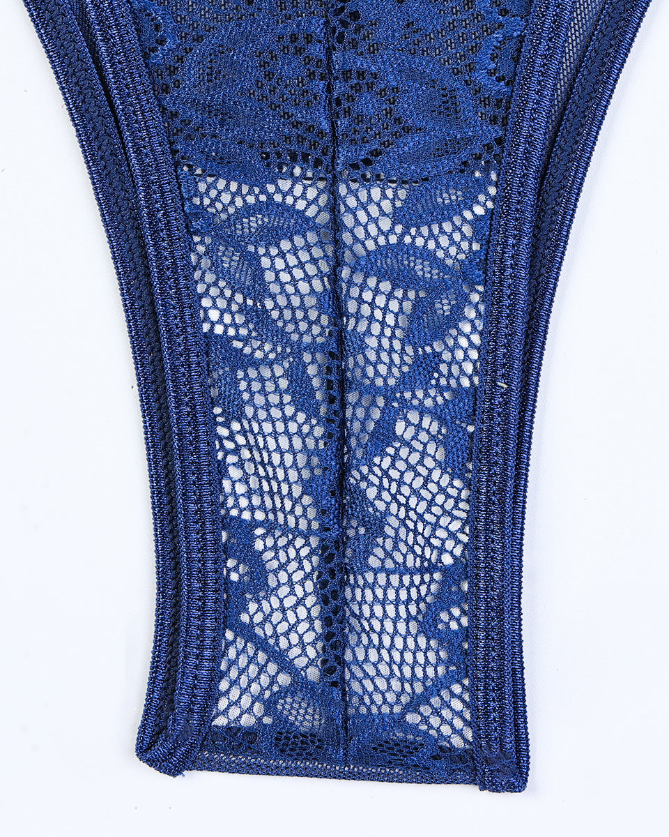 Navy blue floral lace bodysuit detail. Sheer design with satin trim. Sexy lingerie for women.