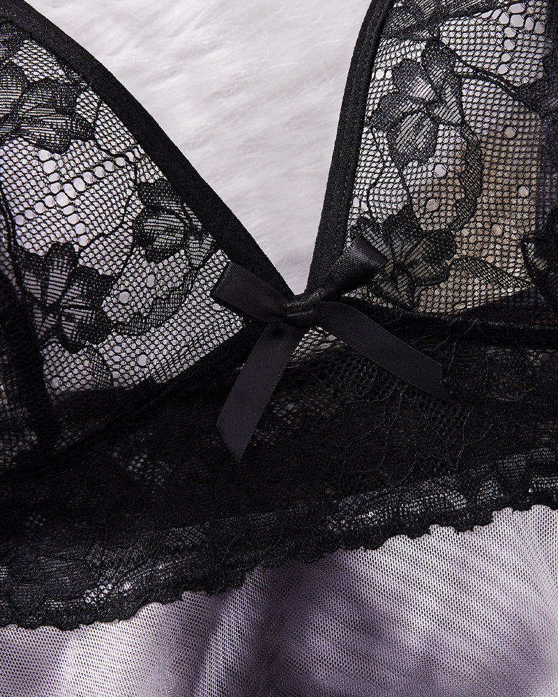 Black lace bralette with bow detail from a Dreamy Gradient Lace Babydoll set. Sensual lingerie.