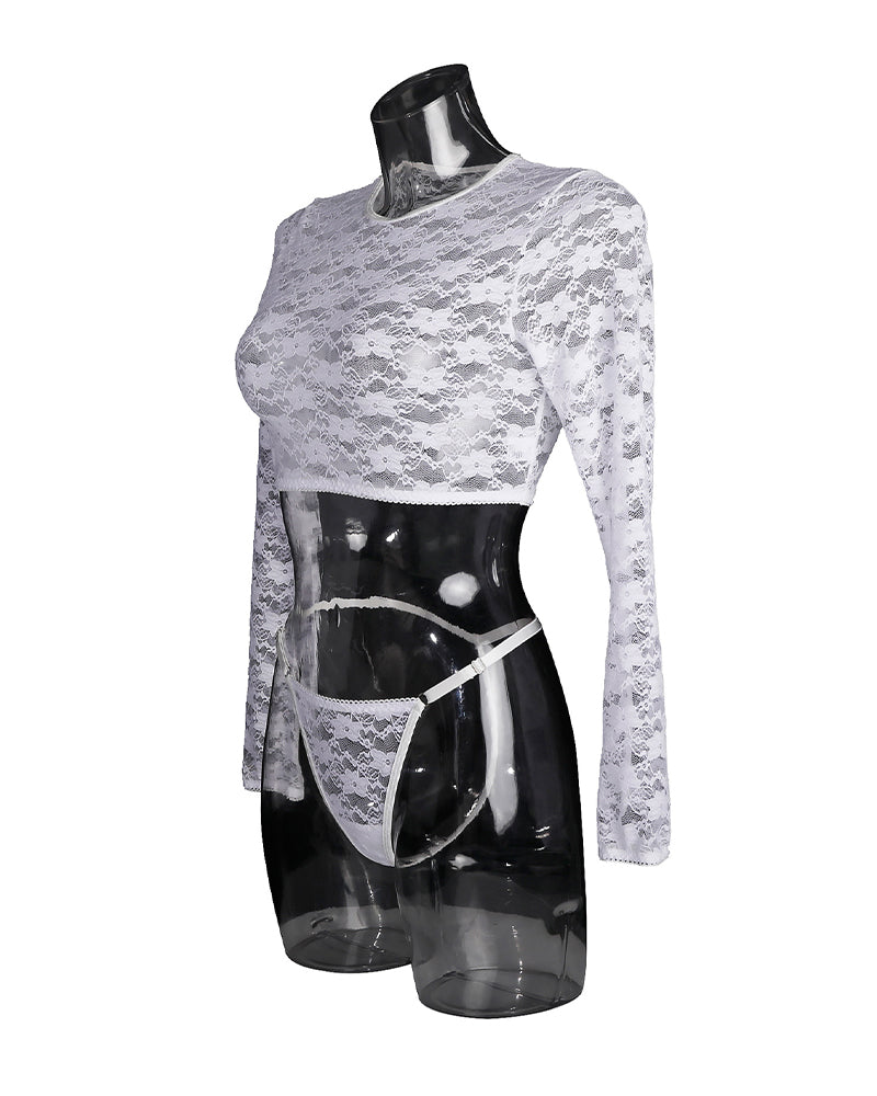 White lace lingerie set with long sleeve crop top and thong, delicate floral lace details.