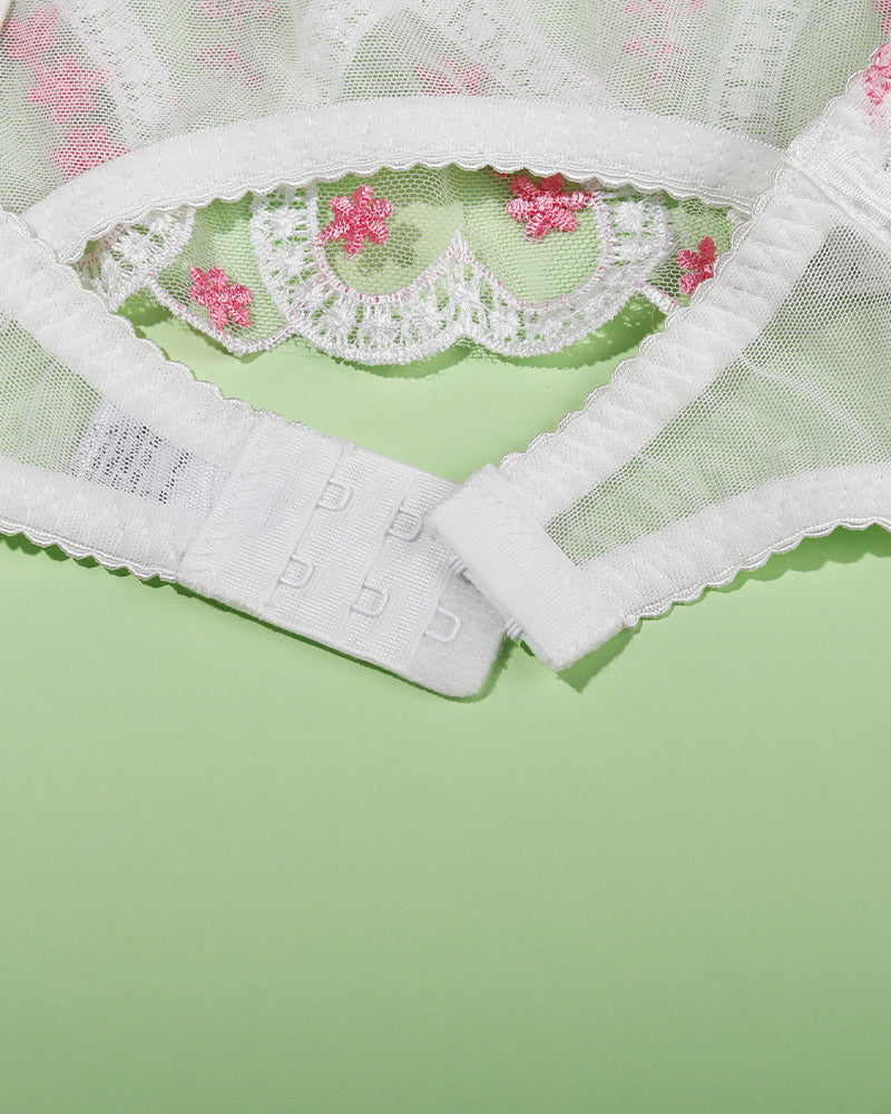 White embroidered heart lace lingerie set with adjustable straps and delicate floral details