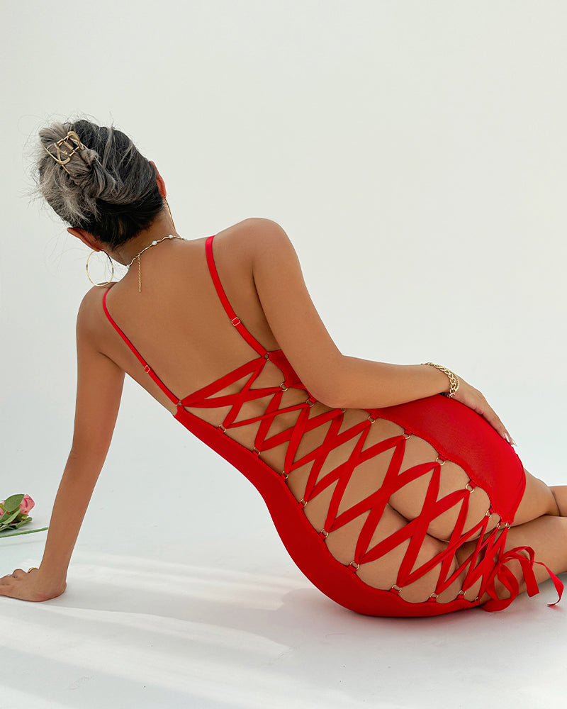 Red backless mini dress with lace-up back and adjustable straps. Elegant and sensual lingerie.