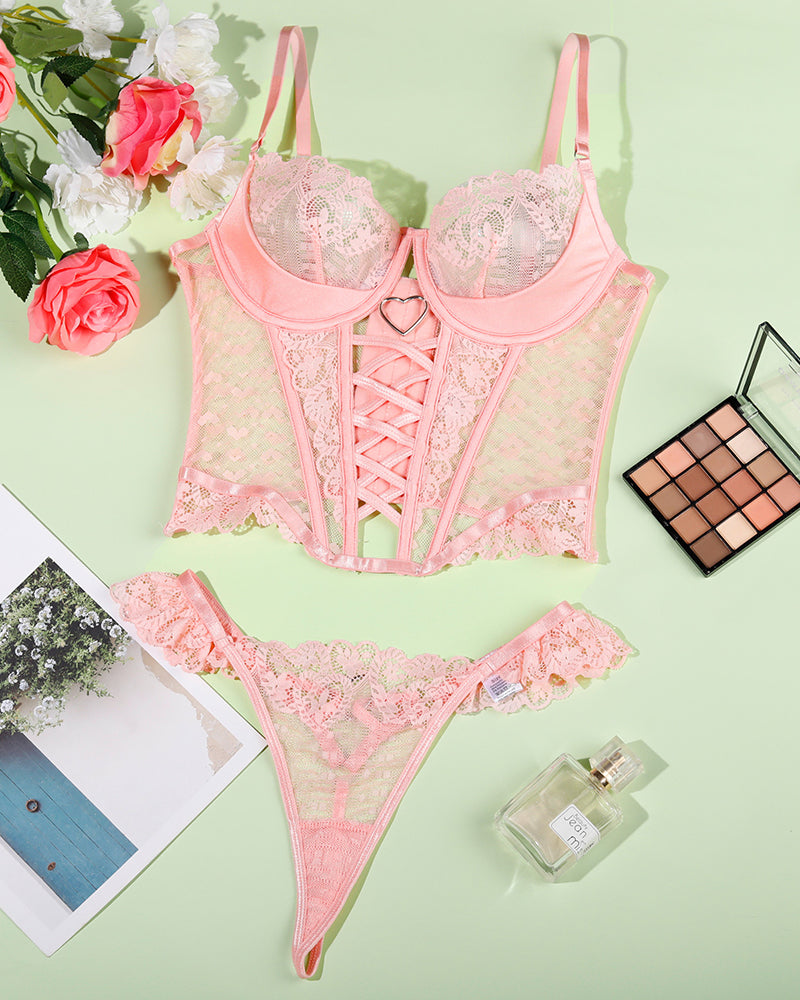 Pink lace heart corset lingerie set with adjustable straps, heart pattern, and thong panty