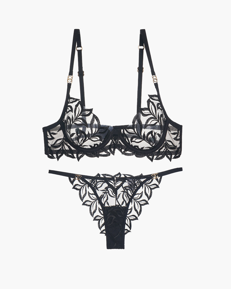 Black lace bra and panty set with floral embroidery, adjustable straps, and see-through design.