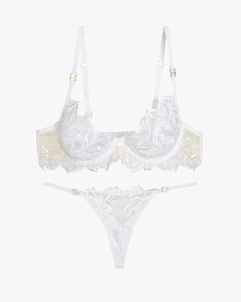 White lace bra and thong set. Embroidered, adjustable straps, underwire. Sweet lingerie.
