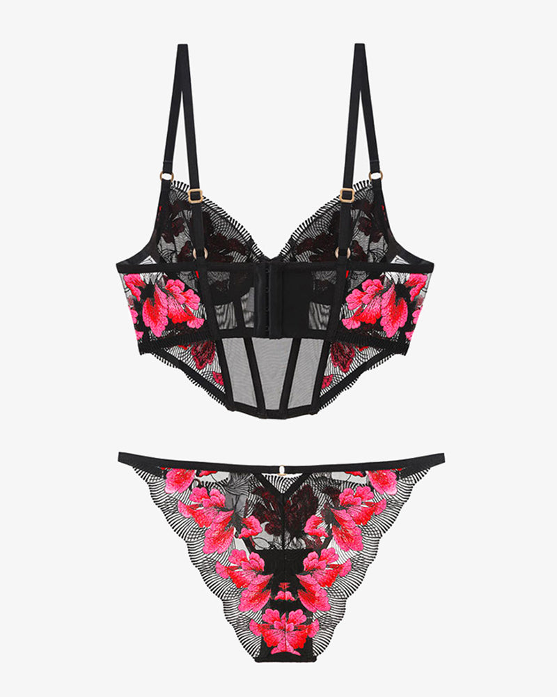 Black embroidered corset bra and panty set with pink floral design. Sweet and seductive lingerie.