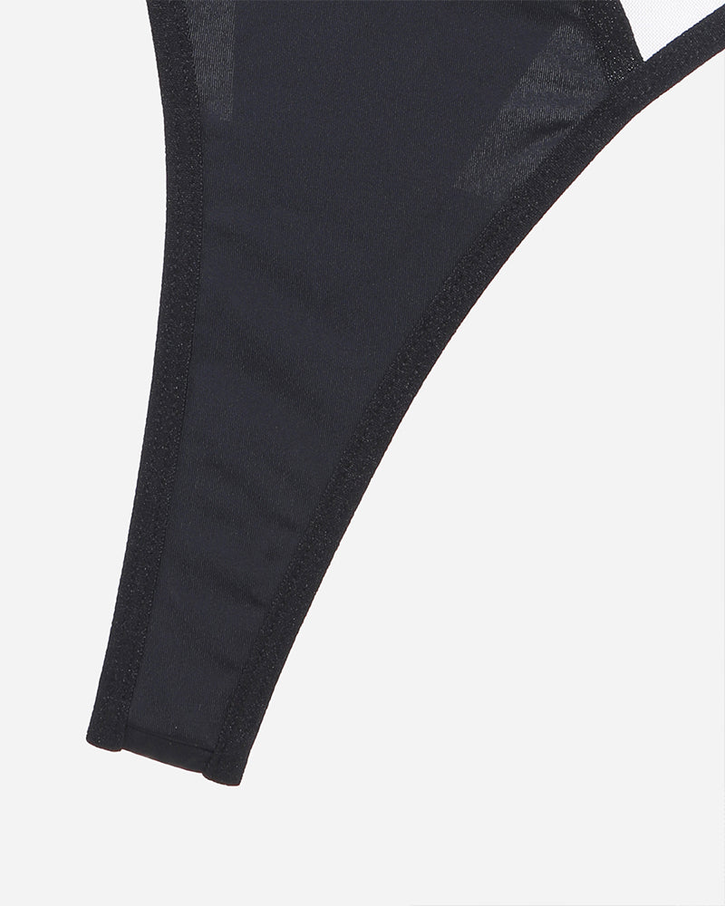 Black thong detail with mesh. Seductive lingerie set. Push Up Mesh Hollow Bra and Thong.