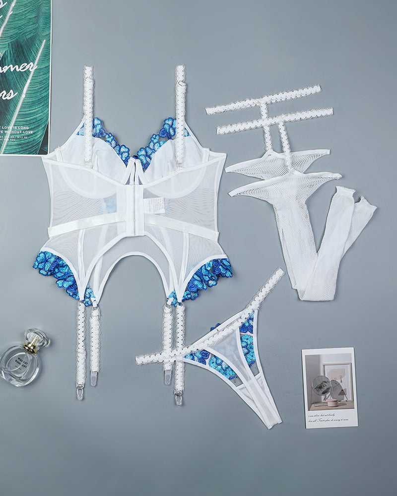 Embroidered white and blue corset set with fishnet stockings and adjustable straps