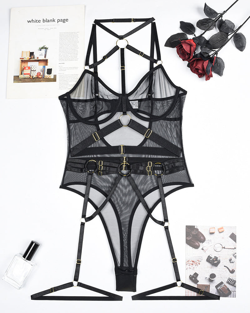 Mesh straps bodysuit with steel ring details. Black lingerie with halter neck and garter straps.