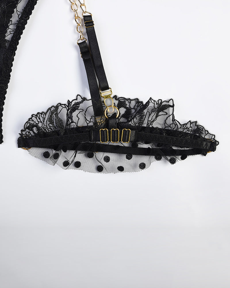 Black lace lingerie set with floral embroidery, gold chain, adjustable straps. Sexy lingerie.