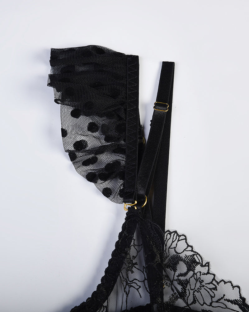 Black floral lace lingerie set with polka dot mesh detail, adjustable straps and gold accents