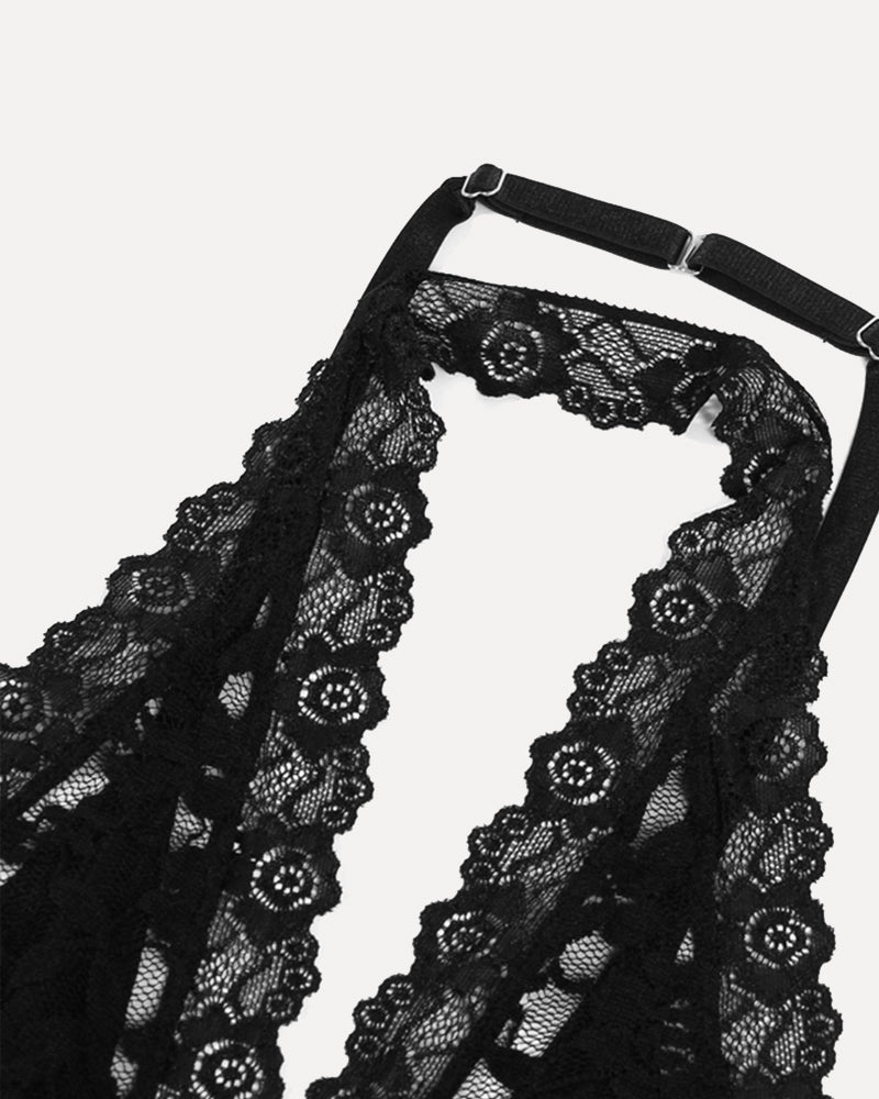Black lace plunge neck halter top with intricate floral lace detailing and adjustable straps.