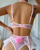 Pink garter belt lingerie set with lace back straps and feather pom detail