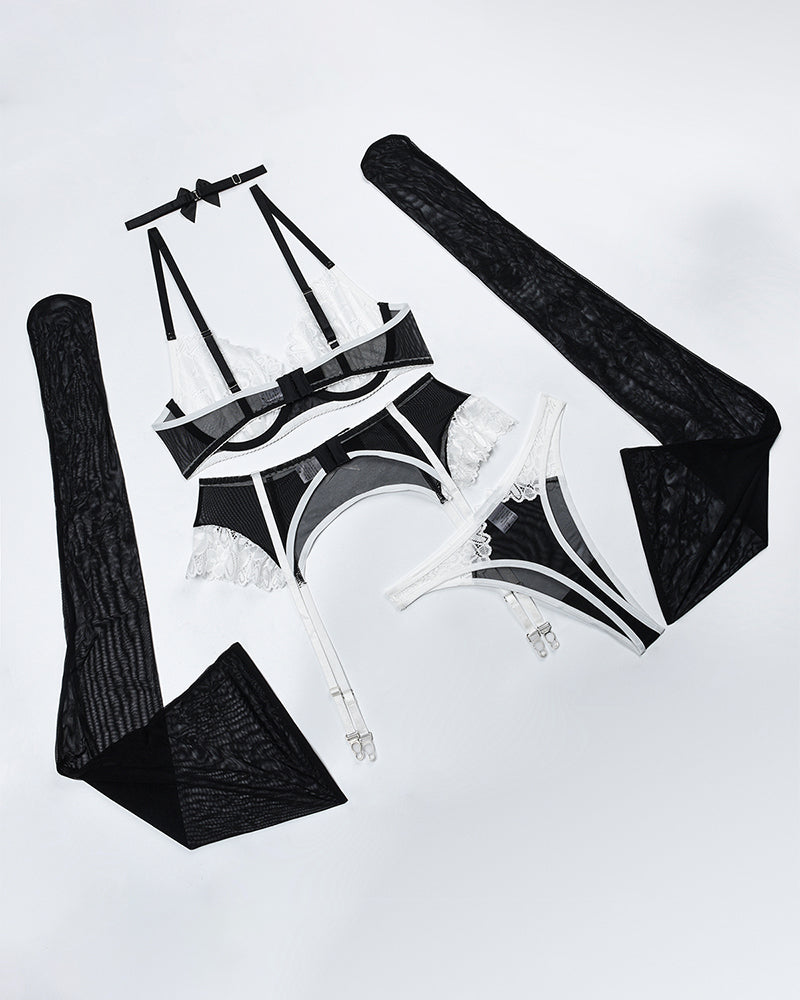Black and white lace lingerie set with choker, push-up bra, garter belt, and stockings.